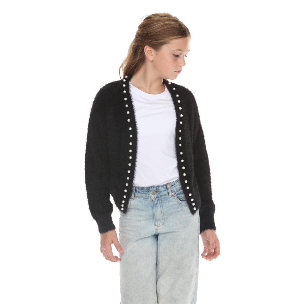 Model wearing the Black pearl trim cardigan open over a white tee and light-wash jeans