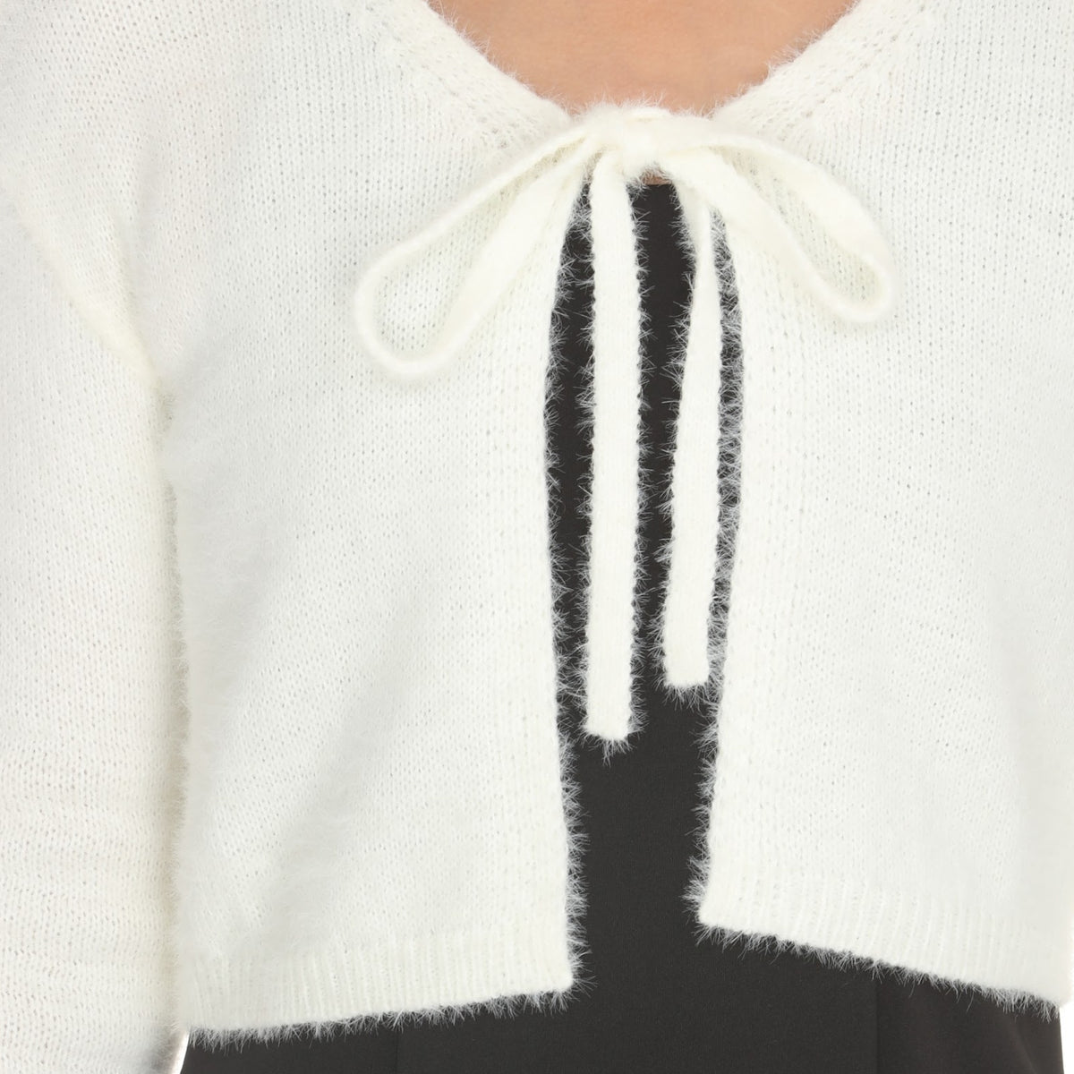 Close-up of the Ivory Tie Front Fuzzy Cardi showing the neckline bow and fuzzy knit